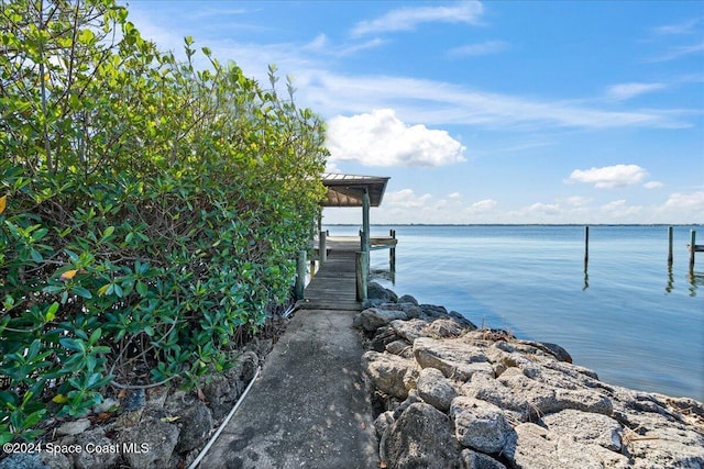 view of dock with a water view