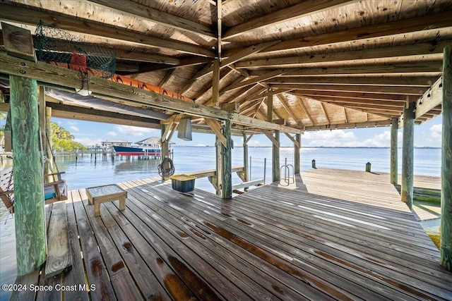 dock area featuring a water view