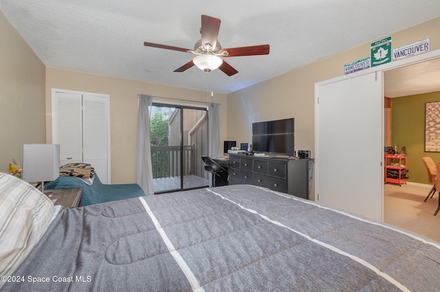 bedroom with carpet flooring, a textured ceiling, access to outside, ceiling fan, and a closet