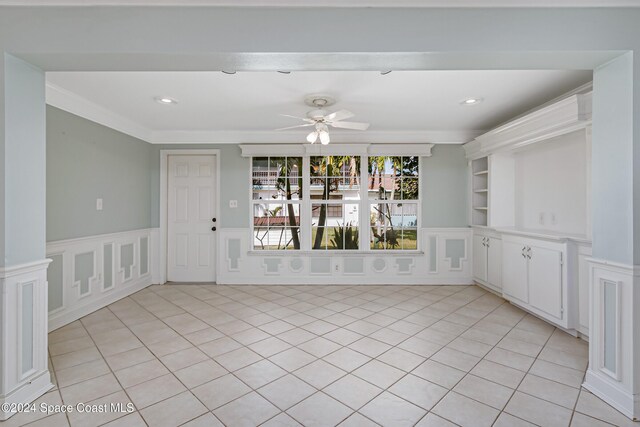 204 Queens Ct, Satellite Beach, FL 32937 - unfurnished room featuring a decorative wall, ceiling fan, wainscoting, light tile patterned floors, and recessed lighting