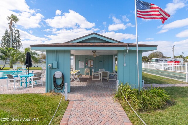 204 Queens Ct, Satellite Beach, FL 32937 - view of home's community with a patio area and outdoor dining area