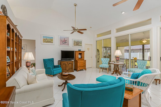 living room featuring high vaulted ceiling, ceiling fan, and light tile patterned flooring