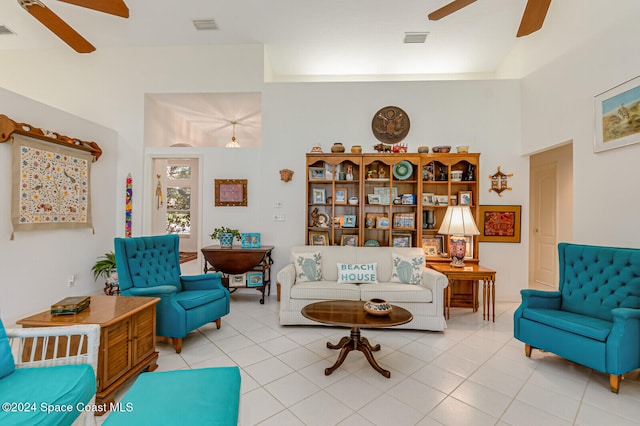 tiled living room with ceiling fan