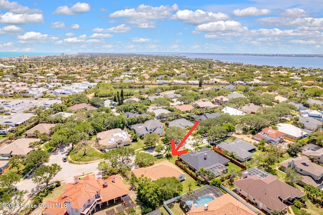 drone / aerial view featuring a water view