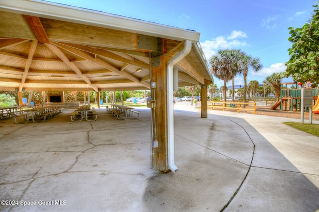 view of patio / terrace with a playground and a gazebo