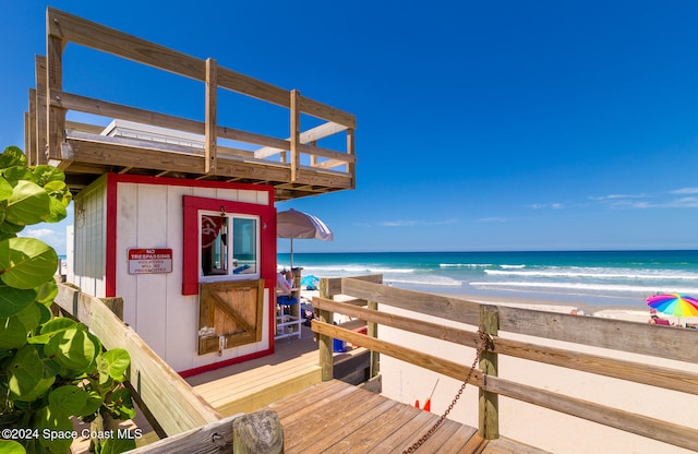 exterior space featuring a beach view