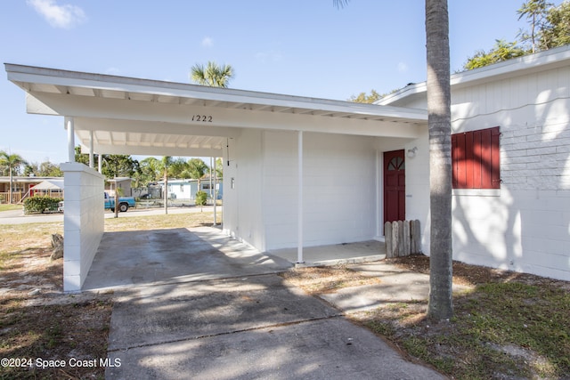 view of parking with a carport