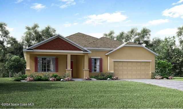 view of front of home with a garage and a front lawn