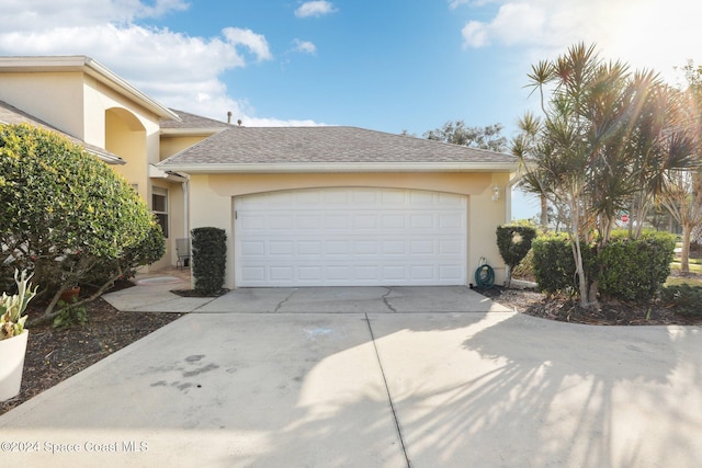 view of front of home with a garage