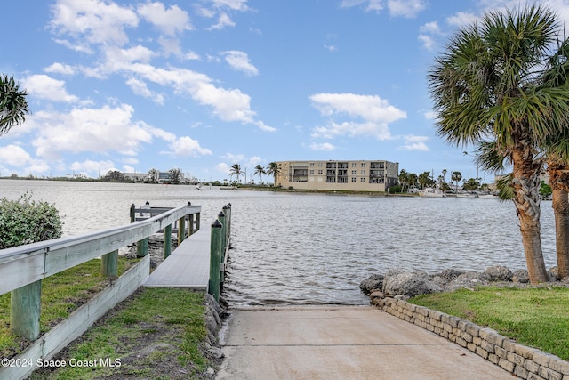 dock area featuring a water view