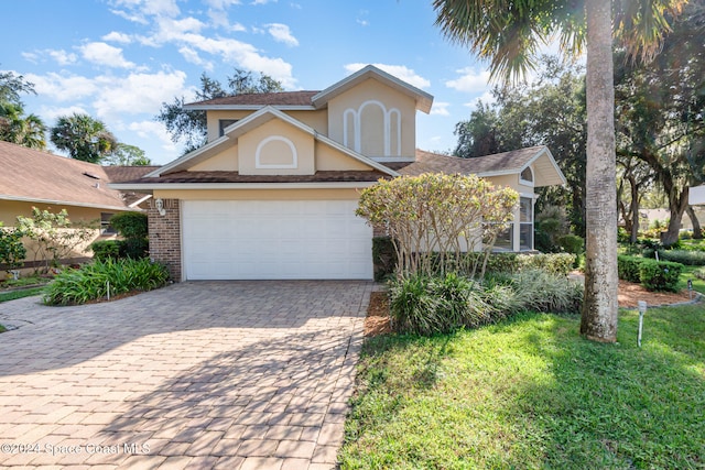 front of property with a garage