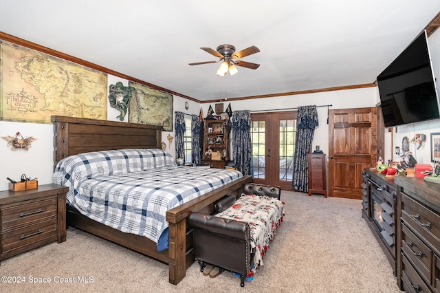 bedroom featuring ceiling fan, crown molding, light carpet, and french doors