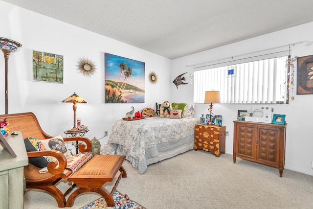 carpeted bedroom featuring a textured ceiling