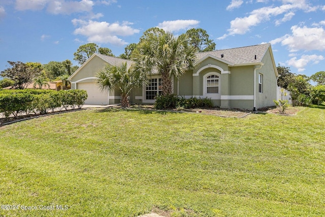 ranch-style house with a garage and a front yard