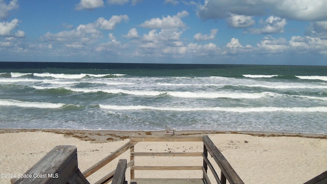 view of water feature with a beach view