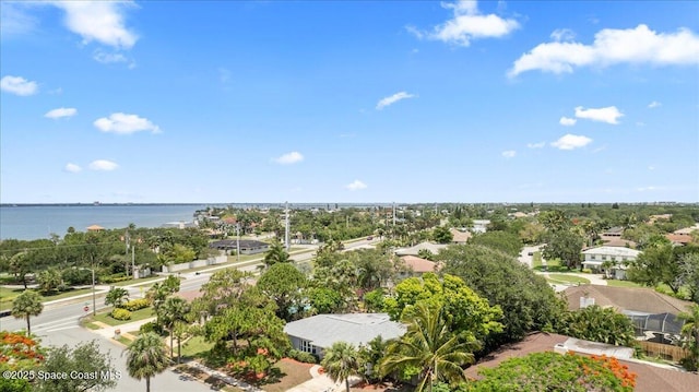 560 Rio Ln, Indialantic, FL 32903 - drone / aerial view of a large body of water and a tree filled landscape