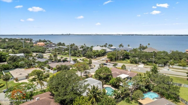 560 Rio Ln, Indialantic, FL 32903 - aerial view of residential area featuring a pool area and a large body of water