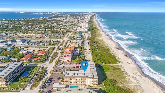 bird's eye view with a view of the beach and a water view