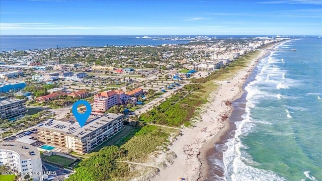 aerial view with a beach view and a water view