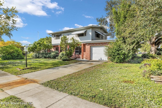 view of property with a garage and a front yard