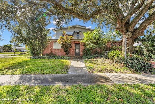 view of front of house with a front yard