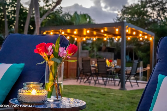 exterior space with carpet and a fire pit