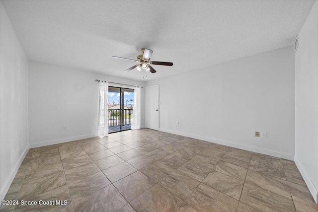 5800 N Banana River Blvd Unit 134, Cape Canaveral, FL 32920 - unfurnished room with visible vents, a ceiling fan, baseboards, and a textured ceiling