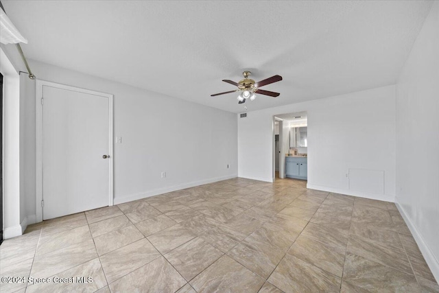 5800 N Banana River Blvd Unit 134, Cape Canaveral, FL 32920 - interior space with baseboards and ceiling fan