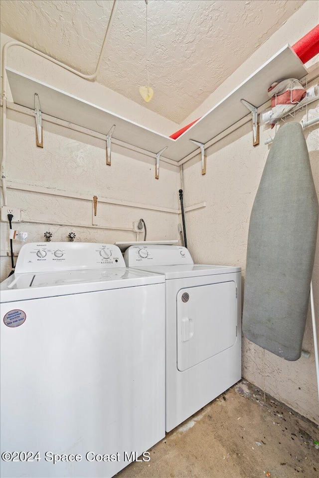 5800 N Banana River Blvd Unit 134, Cape Canaveral, FL 32920 - laundry room with laundry area and washer and clothes dryer