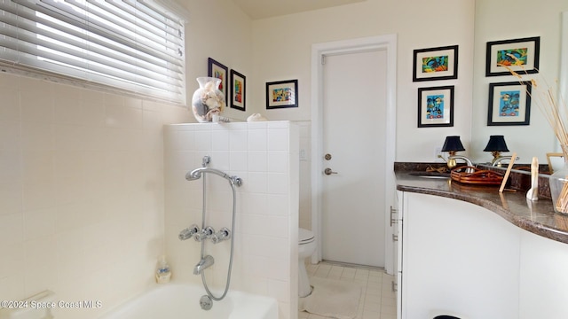 full bathroom with shower / tub combination, tile patterned floors, vanity, and toilet