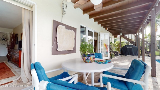 view of patio / terrace featuring ceiling fan