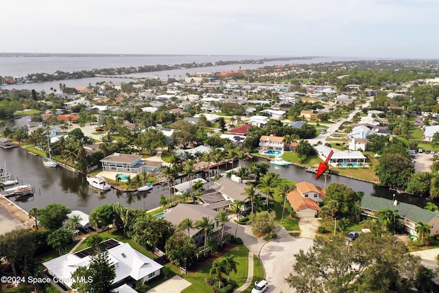 bird's eye view with a water view