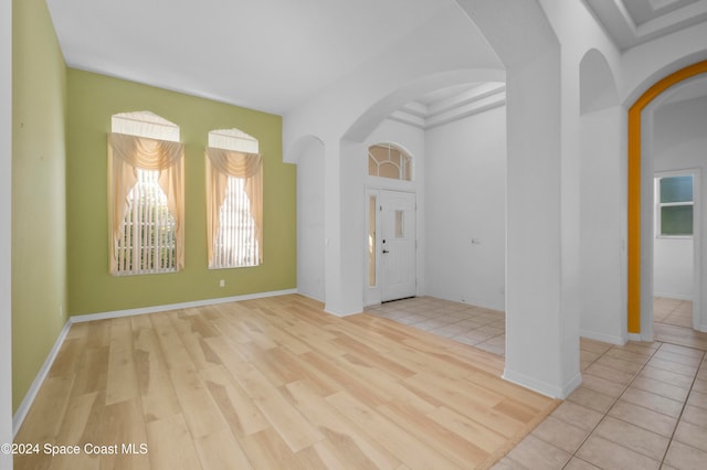 unfurnished room with light wood-type flooring