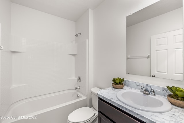 full bathroom featuring vanity, toilet, and bathtub / shower combination