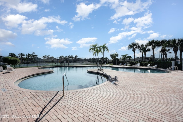 view of pool featuring a patio area