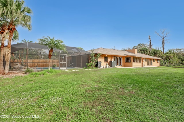 view of yard featuring a lanai