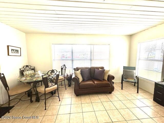 living area featuring light tile patterned floors