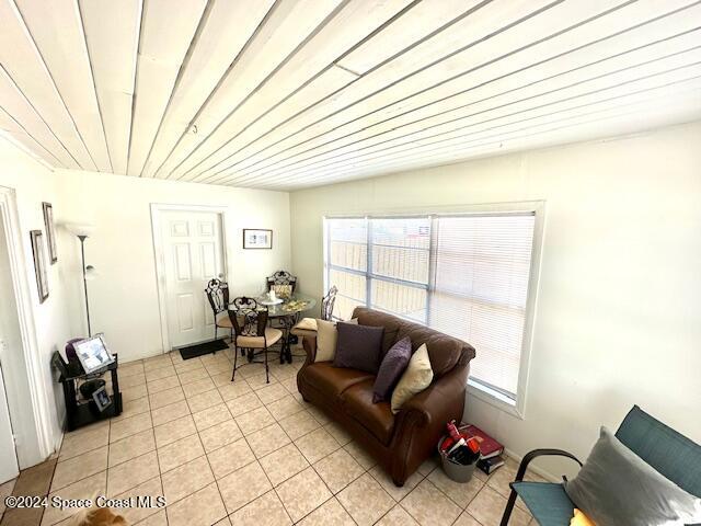 living room featuring wooden ceiling