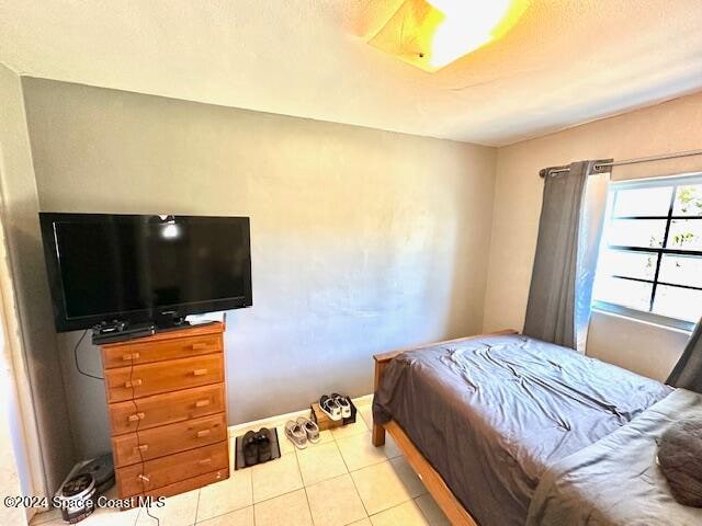 view of tiled bedroom