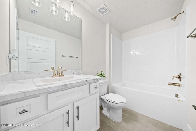 full bathroom with shower / tub combination, vanity, a textured ceiling, and toilet