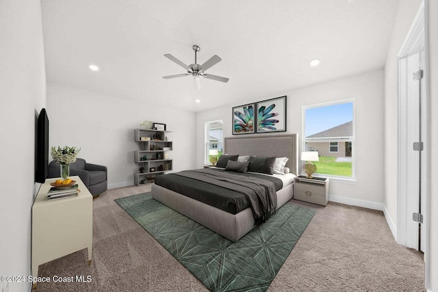 carpeted bedroom with ceiling fan