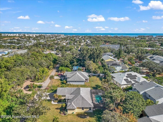 birds eye view of property featuring a water view