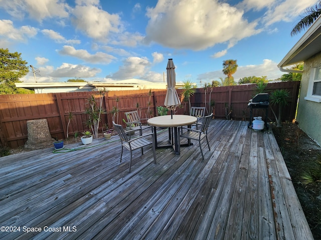 wooden terrace with grilling area