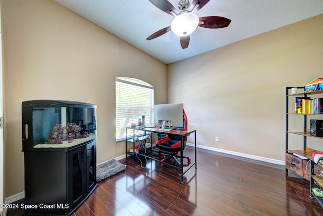 office area featuring dark wood-type flooring, ceiling fan, and lofted ceiling