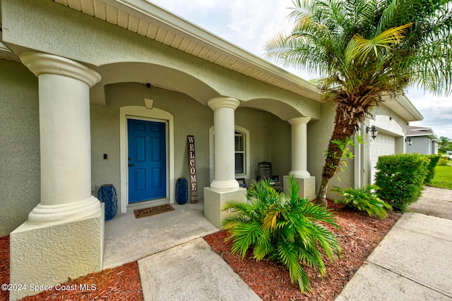 entrance to property with a garage