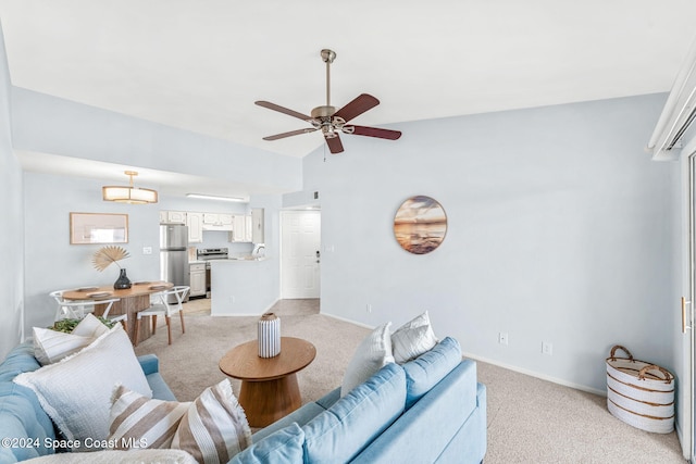 living room with ceiling fan, light colored carpet, and vaulted ceiling