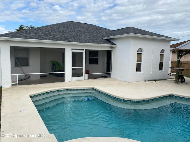 view of swimming pool with a patio