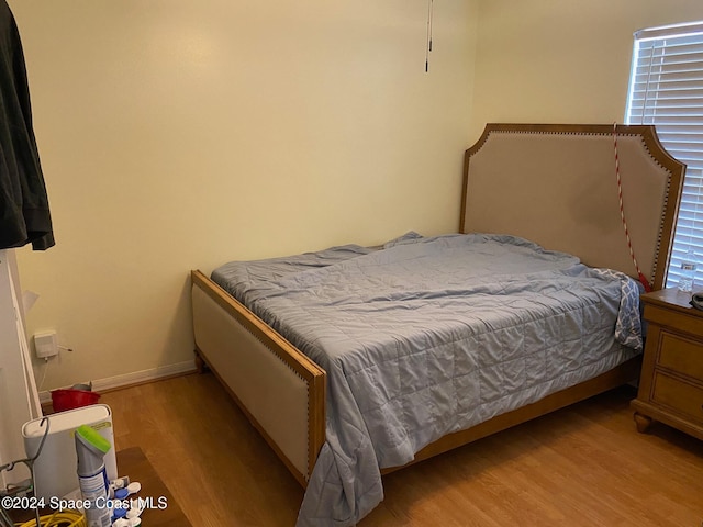 bedroom featuring light wood-type flooring