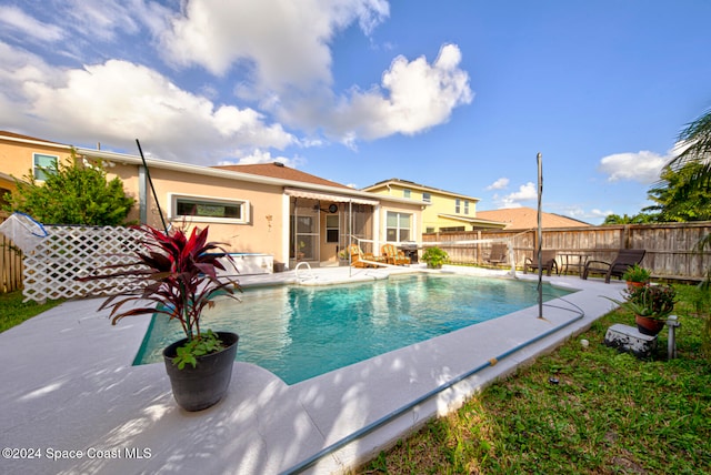 view of pool featuring a patio area