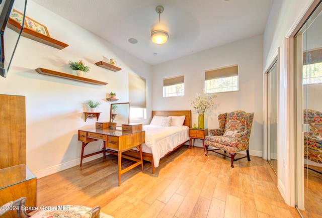 bedroom with light wood-type flooring